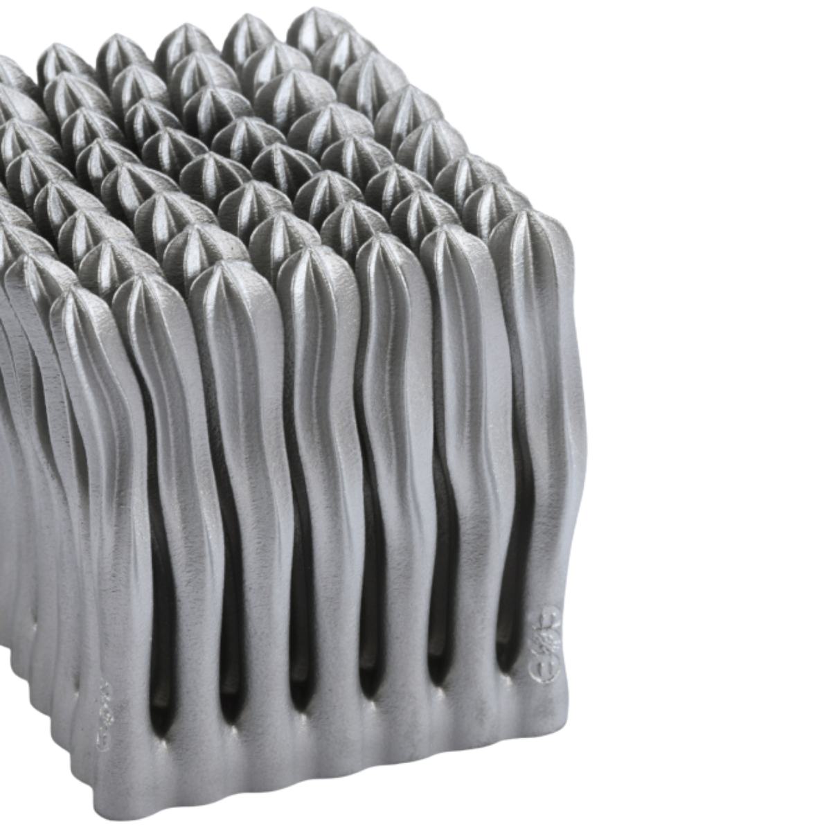 Metallic gray part made of aluminium.