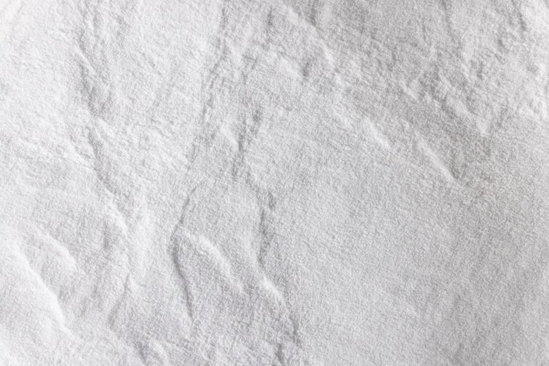 Close up of white polymer powder.