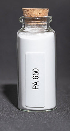 Glass bottle filled with white polymer powder.