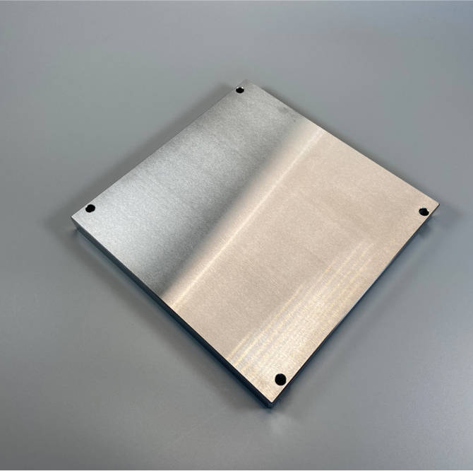 Photo of a rectangular aluminium building platform from the top.