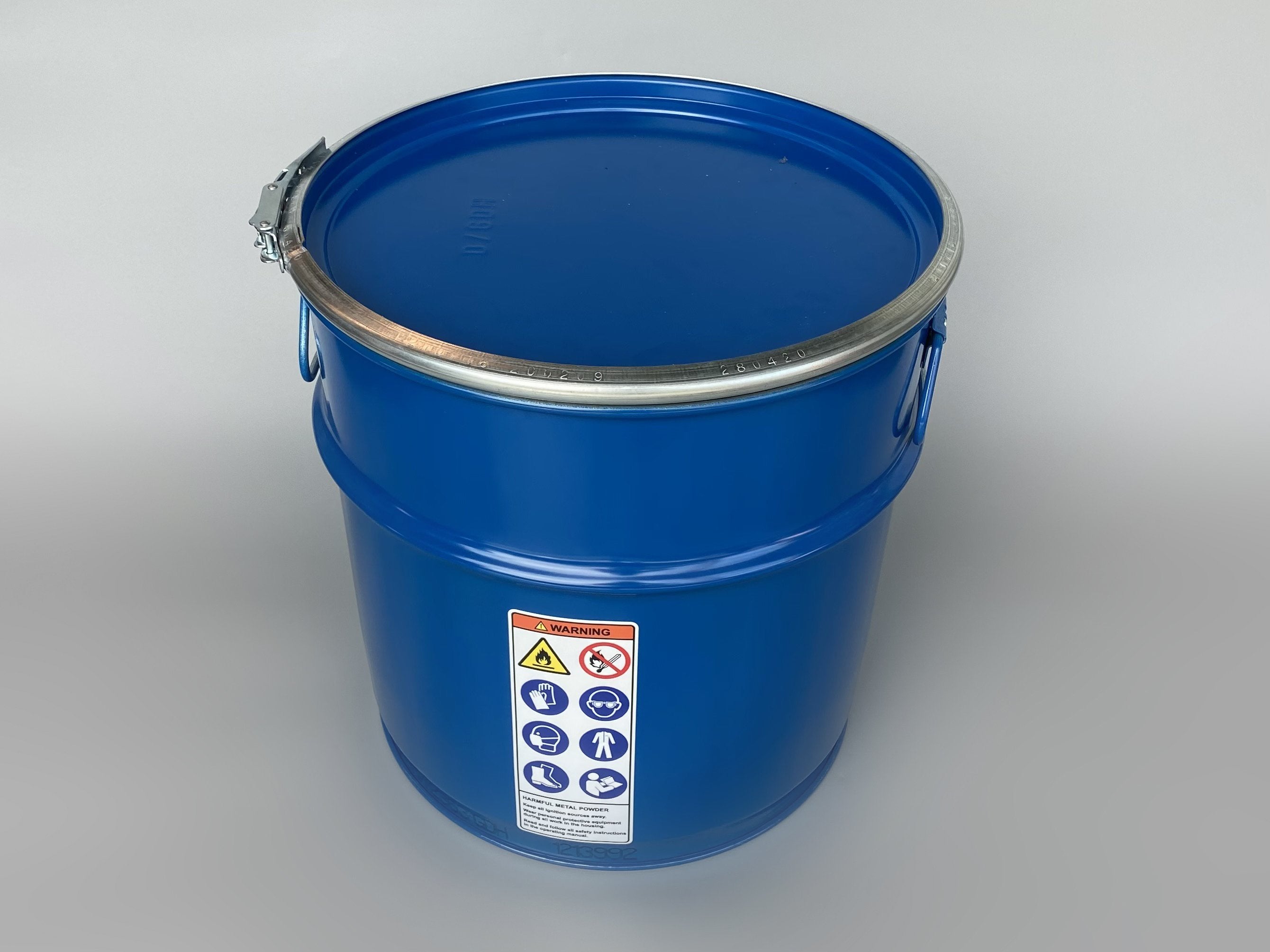 Open top metallic blue drum.