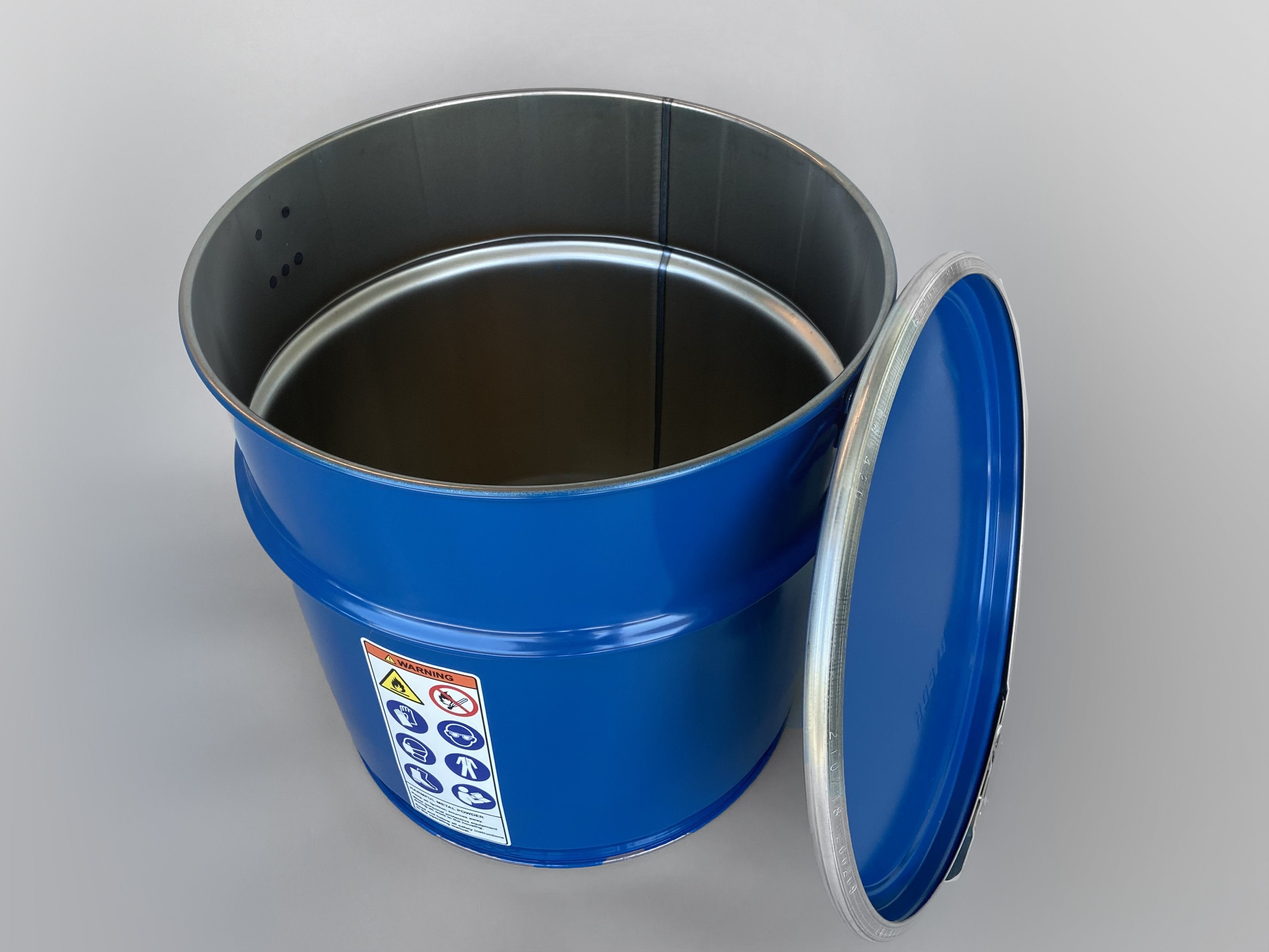 Open top metallic blue drum.